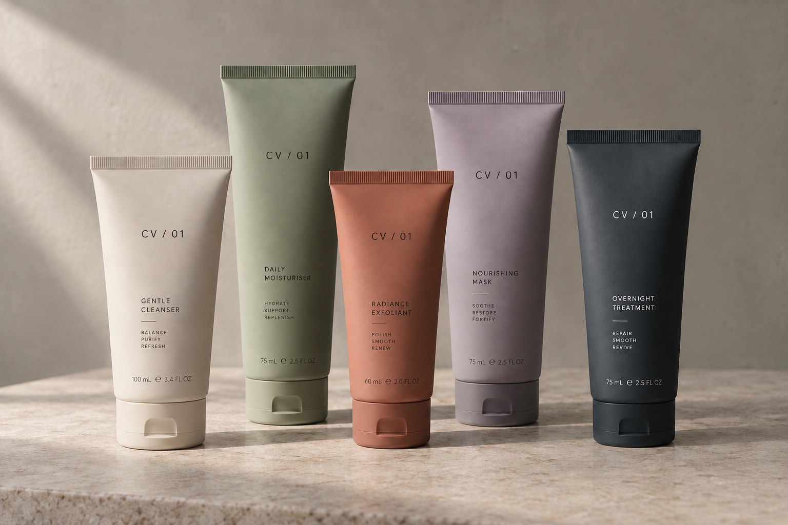 Five matte care tubes in ivory, sage, clay, lilac and deep blue-black
